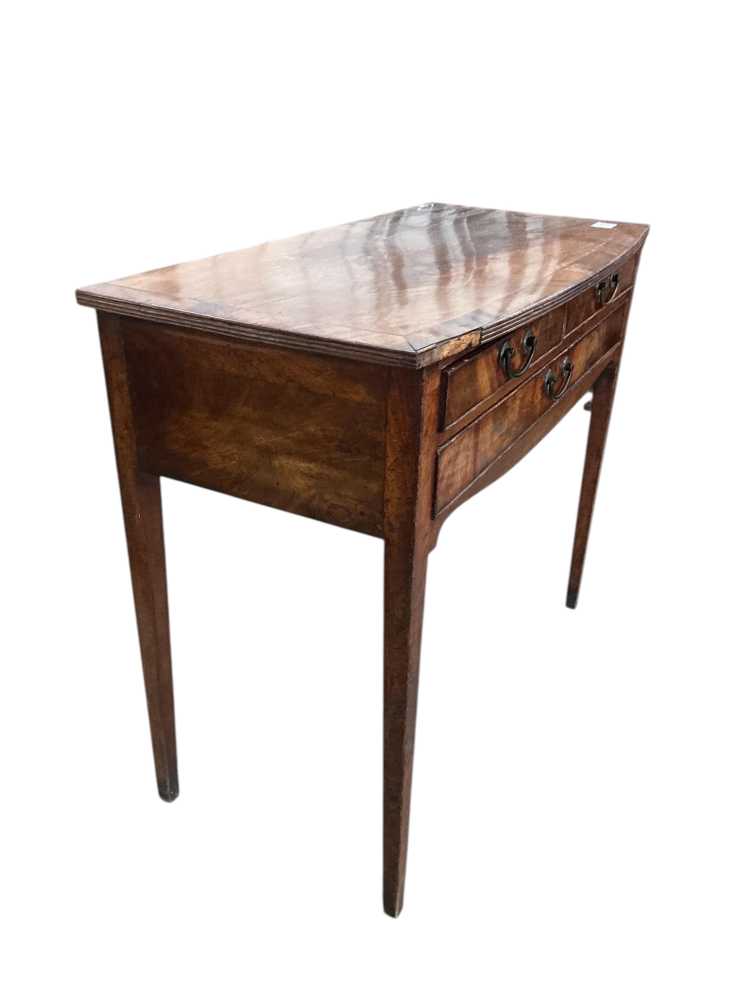 A George III mahogany bow front side table, width 88cm, depth 44cm, height 76cm
